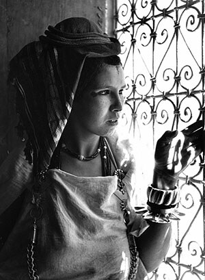 Amazigh or Berber woman from Tinerhir with traditional tattoos, Morocco