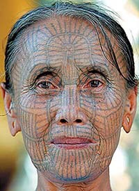 Chin woman with traditional face tattoo