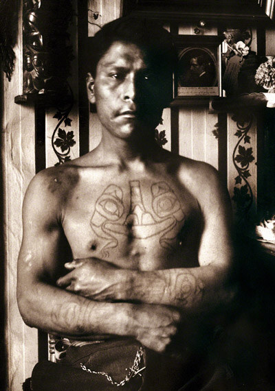 Johnny Kit Elswa with a bear totem tattooed on his chest, Haida