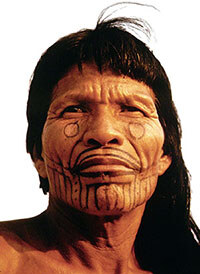 Karajá chief with traditional face paint and tattoo
